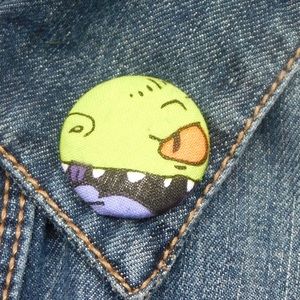 Reptar lapel pin